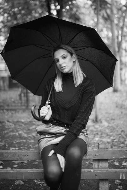Stylish woman with umbrella - Photo, Image