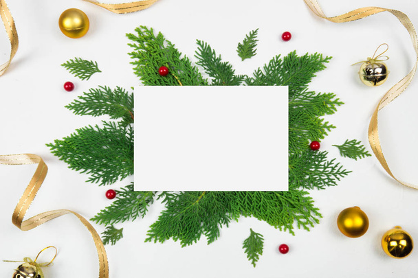 Creative Christmas layout. Christmas wreath on white background whit copy space. Border arrangement. Flat lay top view.  - Photo, Image