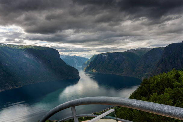 View of the Aurlandsfjord fjord with Stegastein viewing platform. It is a fjord in Sogn og Fjordane county, Norway, a branch of the main Sognefjorden. Length 29 km - Zdjęcie, obraz