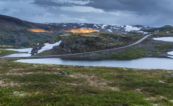Mountain landscape along the National tourist route Aurlandstjellet. Flotane. Bjorgavegen. Western Norway - Fotoğraf, Görsel