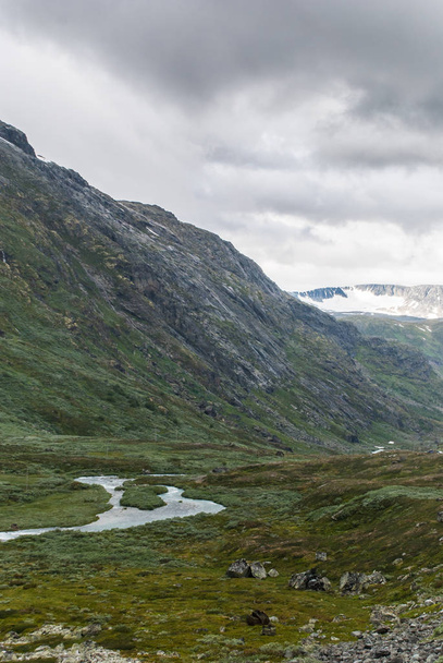 Landscape in national tourist route Sognefjellet in cloudy weather, Norway - 写真・画像