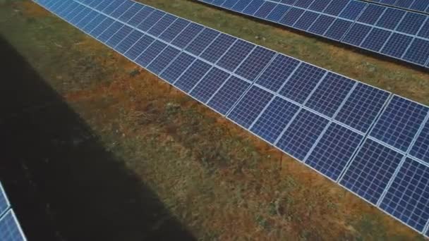 Rows of solar panels on the field. Shot on drone - Video, Çekim