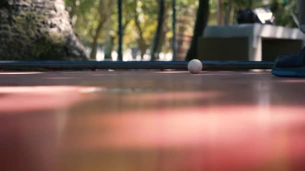Missed hole on mini golf course low angle closeup - Footage, Video