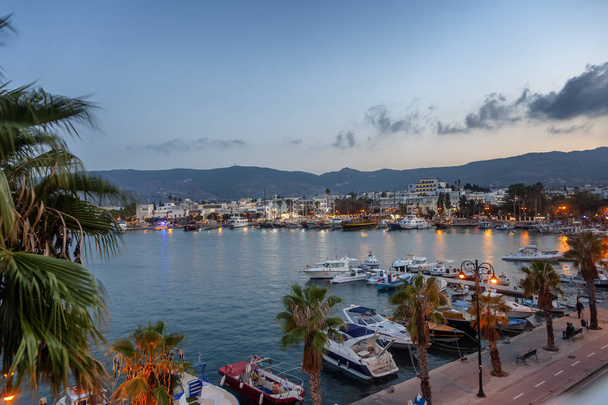 The capital of the island of Kos, Greece, view of the city and marina at sunset, a popular destination for travel in Europe - Photo, image