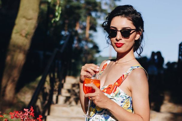 beautiful woman drinking cocktail - Fotó, kép