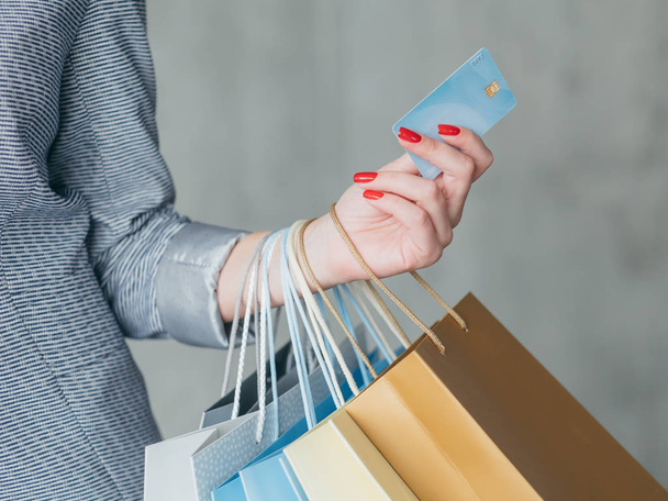money loan shopping woman hold credit card bags - Фото, изображение