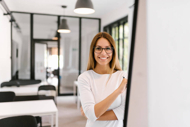 Portrait of smiling female entrepreneur. - Foto, Imagen