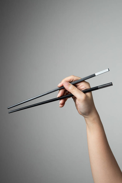 рука chopstick азіатська японська китайська їжа стиль традиційний
 - Фото, зображення