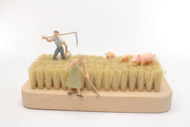 la diversión de la mini figura del trabajo del agricultor
 - Foto, Imagen