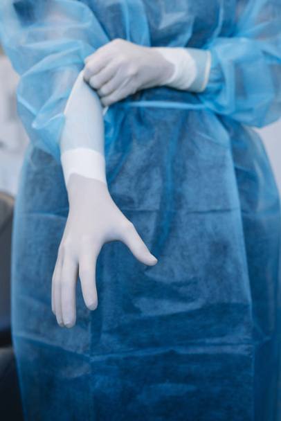 doctor in rubber gloves / concept sterility purity, medical clinic, laboratory, gloves on the hands of a doctor - Fotoğraf, Görsel