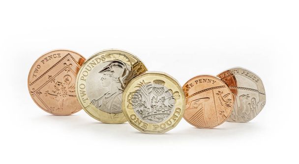 UK pieniądze, Brytyjskie monety tym grosza i Funt - Zdjęcie, obraz