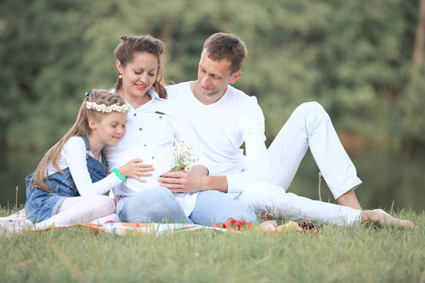 concept of family happiness - pregnant mother and happy father a - Photo, Image