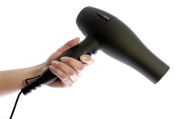 Hairdryer in hand isolate - Foto, immagini