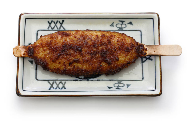 gohei mochi, lanche de arroz com molho miso doce, comida local japonesa
 - Foto, Imagem
