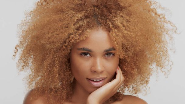 mixed race black blonde model with curly hair - Photo, Image
