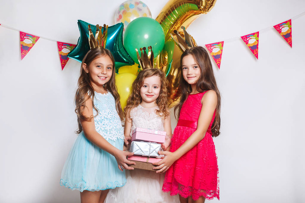 Group of kids celebrate birthday party together. Holidays concept. - Foto, imagen