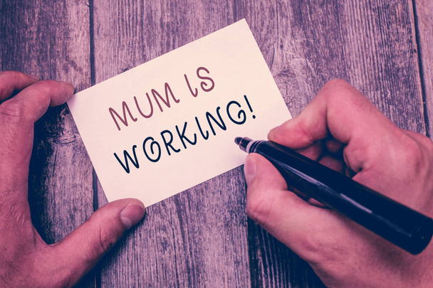 Writing note showing Mum Is Working. Business photo showcasing Financial Empowerment and professional progressing mother - Photo, Image