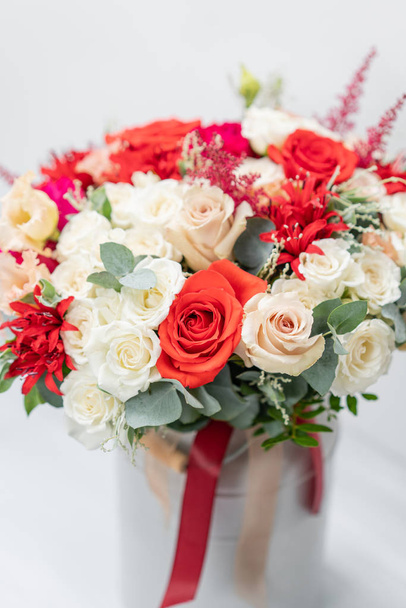 beautiful spring bouquet. Flowers arrangement with red and white colors. - Photo, image