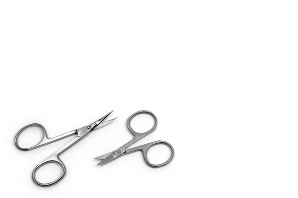 Nail Clippers for nail and cuticle care. Two scissors of different size on white background. - Fotoğraf, Görsel