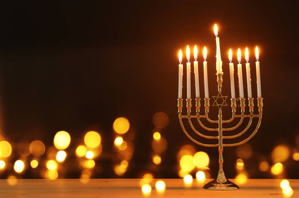 image of jewish holiday Hanukkah background with menorah (traditional candelabra) and candles - Photo, Image