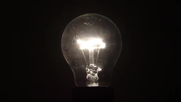 Electric lamp in darkness turning off - Footage, Video