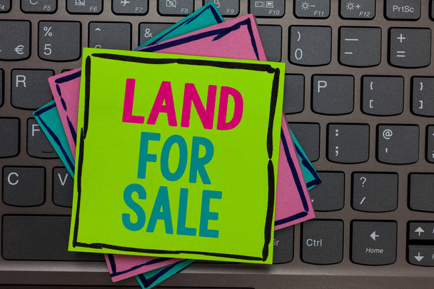 Handwriting text writing Land For Sale. Concept meaning Real Estate Lot Selling Developers Realtors Investment Papers reminders keyboard Inspiration communicate Annotations Type computer. - Photo, Image