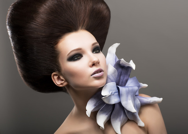 Extravagance. Classy Woman with Lily. Stylish Hairdo. Luxury - Foto, imagen