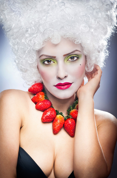 Sexy girl with strawberry necklace - Fotoğraf, Görsel