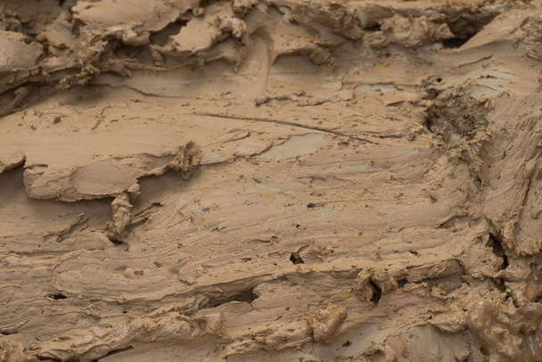 крупним планом мокра коричнева глина
 - Фото, зображення