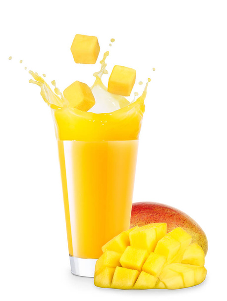 glass of splashing mango juice - Фото, изображение