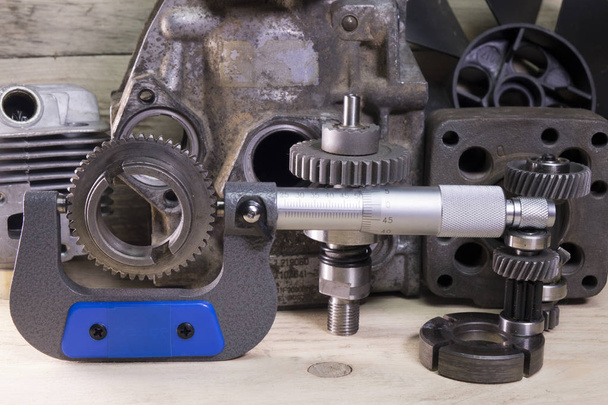 measurement  parameters of gears, details by  mechanical micrometer - Photo, Image