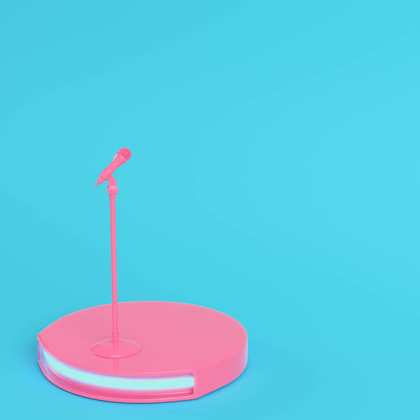 Stage with microphone on bright blue background in pastel colors. Minimalism concept. 3d render - 写真・画像