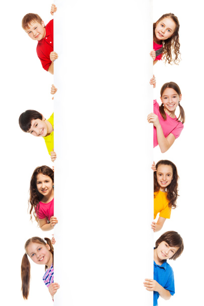 Six kids looking from blank billboard - Valokuva, kuva