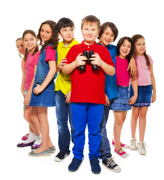 Boy with binoculars with other kids - Фото, изображение