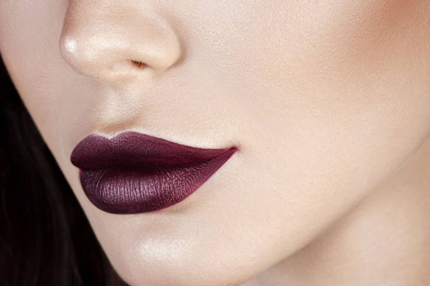 Luxurious young woman with perfect make-up with purple lipstick. Anonymous beauty close-up portrait - Foto, Bild