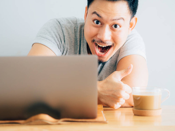 Wow face of asian man use laptop. - Fotografie, Obrázek