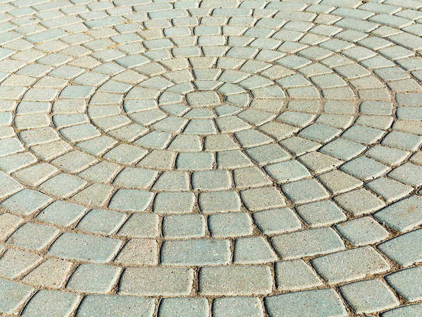 Close-up paving slabs by mosaic. Road paving, construction. Tessellated sidewalk tile. Colored concrete paving slab. - Foto, Imagen
