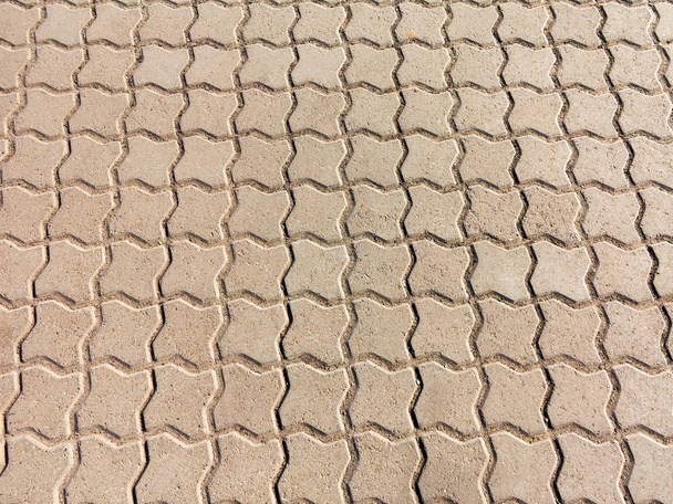 Sidewalk tile. Close-up paving slabs by mosaic. Road paving, construction. Colored concrete paving slab. Diagonal. - Foto, Imagen