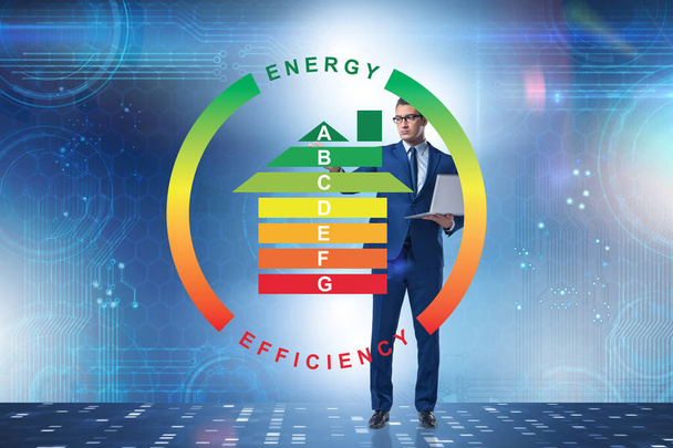 Empresario en concepto de eficiencia energética
 - Foto, Imagen