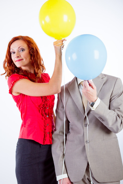 Business man and woman with air balloons - Photo, Image