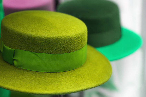 Green felt hat with ribbon - 写真・画像