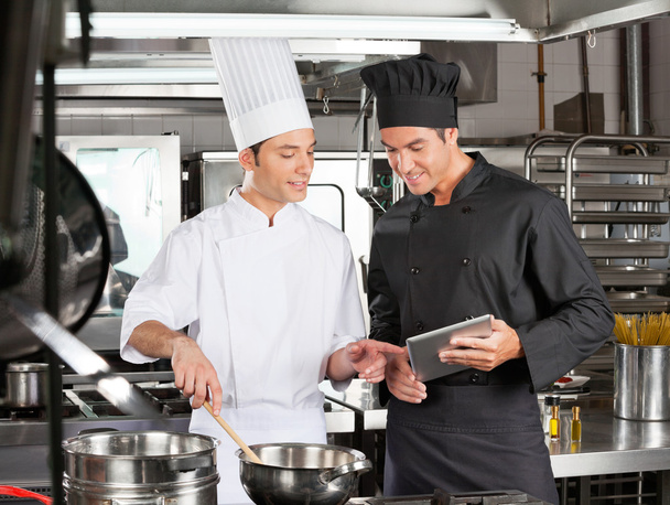 Male chefs Preparing Food Together - Фото, зображення