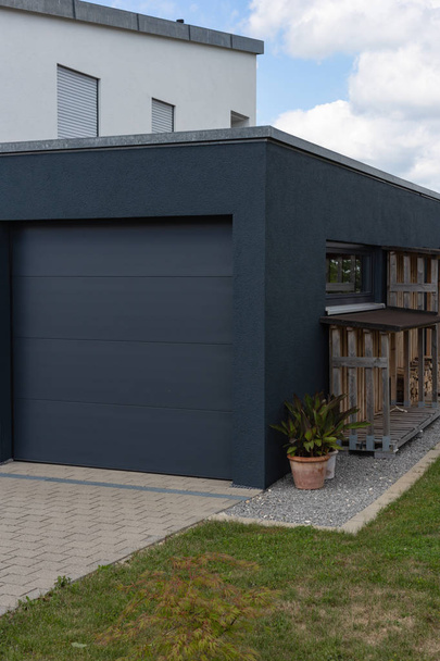 modern black garage in suburban street in south germany countryside near city stuttgart - Фото, зображення