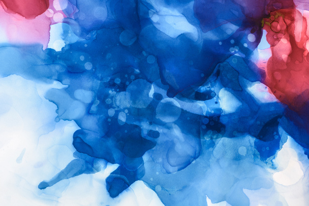beautiful blue, red and violet splashes of alcohol inks as abstract background - Foto, immagini