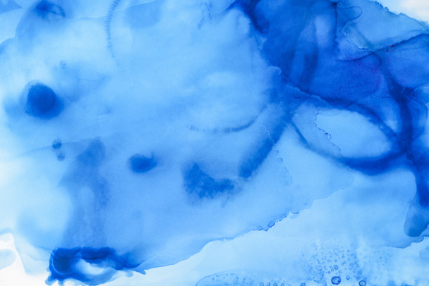 artistic blue splashes of alcohol ink as abstract background - Photo, Image