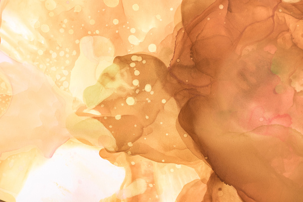 brown splashes of alcohol ink as abstract background - Photo, Image