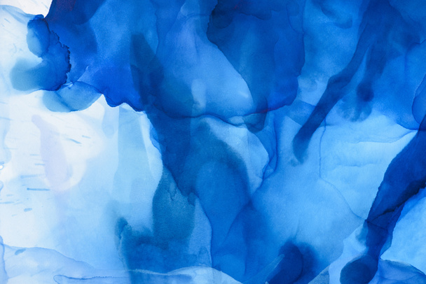 salpicaduras azules de tinta de alcohol como fondo abstracto
 - Foto, imagen