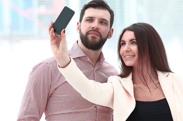 modern business couple taking selfie in office - Photo, image