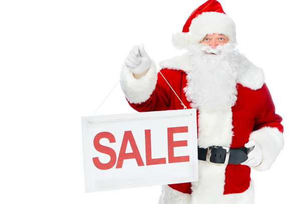 santa claus holding sale board for shopping isolated on white - Zdjęcie, obraz