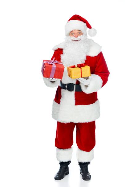 bearded santa claus with christmas gift boxes isolated on white - Фото, изображение